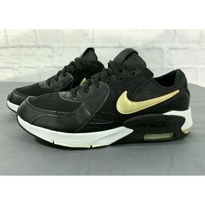 Nike Sneakers With Gold Swoosh 